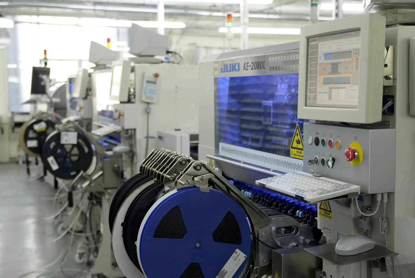 Surface mount placement machines on an electronics assembly line